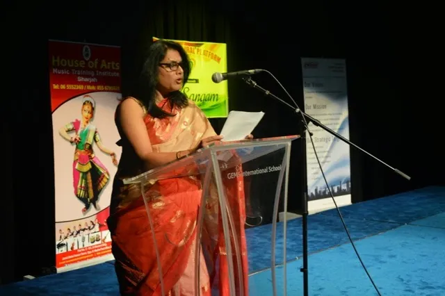 Jaya Sarkar presenting a speech at a cultural felicitation event