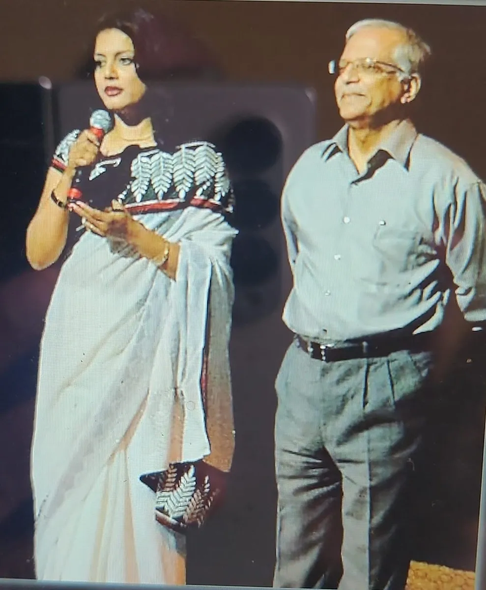 Jaya Sarkar presenting her latest publication to a distinguished guest